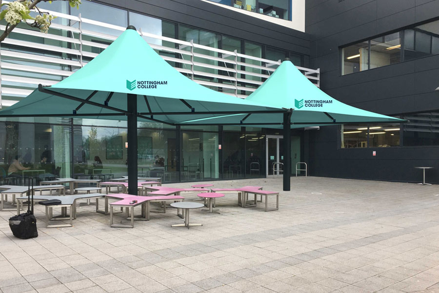 Proposed tensile shade structures superimposed into a courtyard